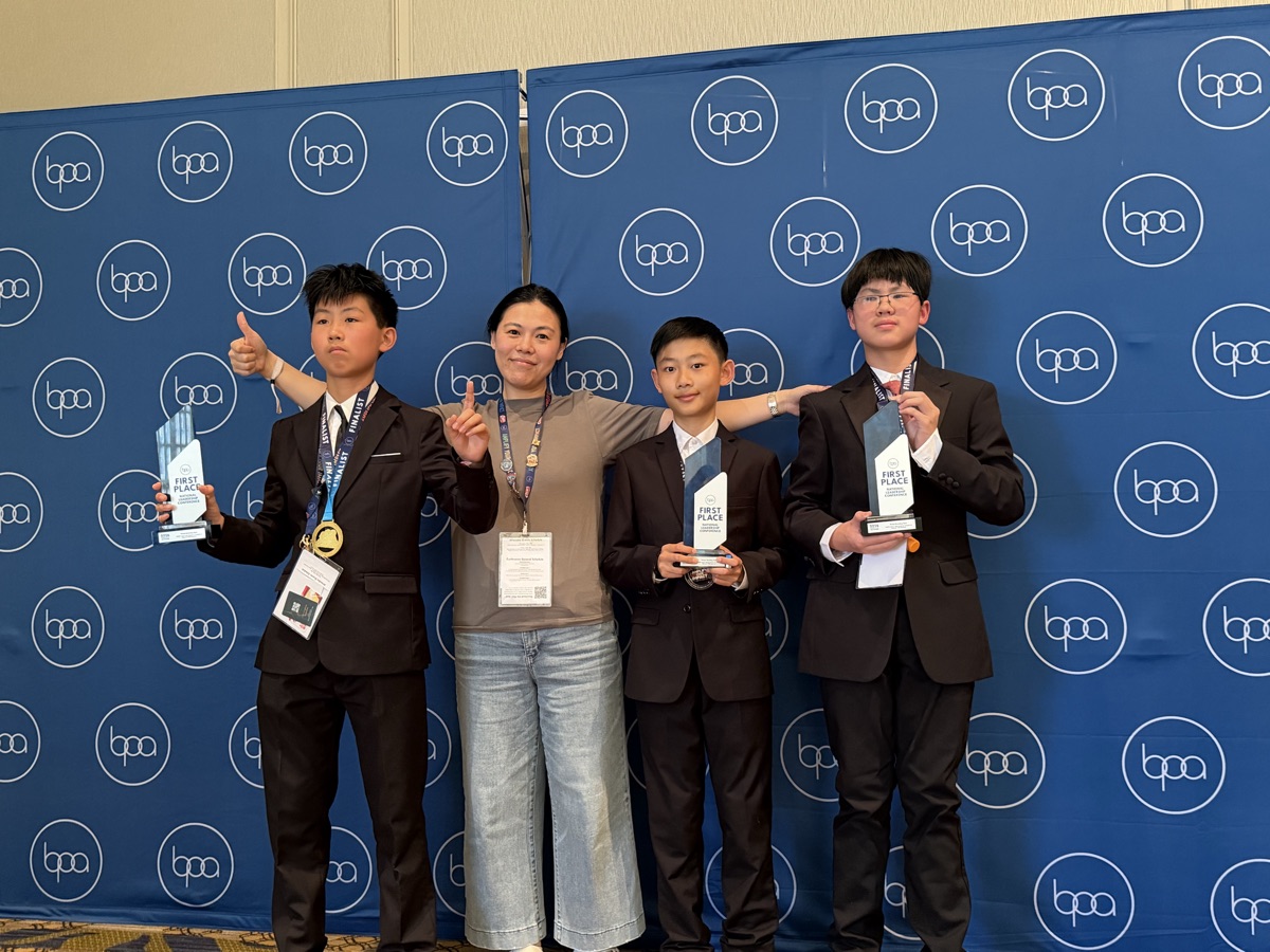 Three Beyond Young students holding First Place trophies with their coach at BPA Nationals 2026